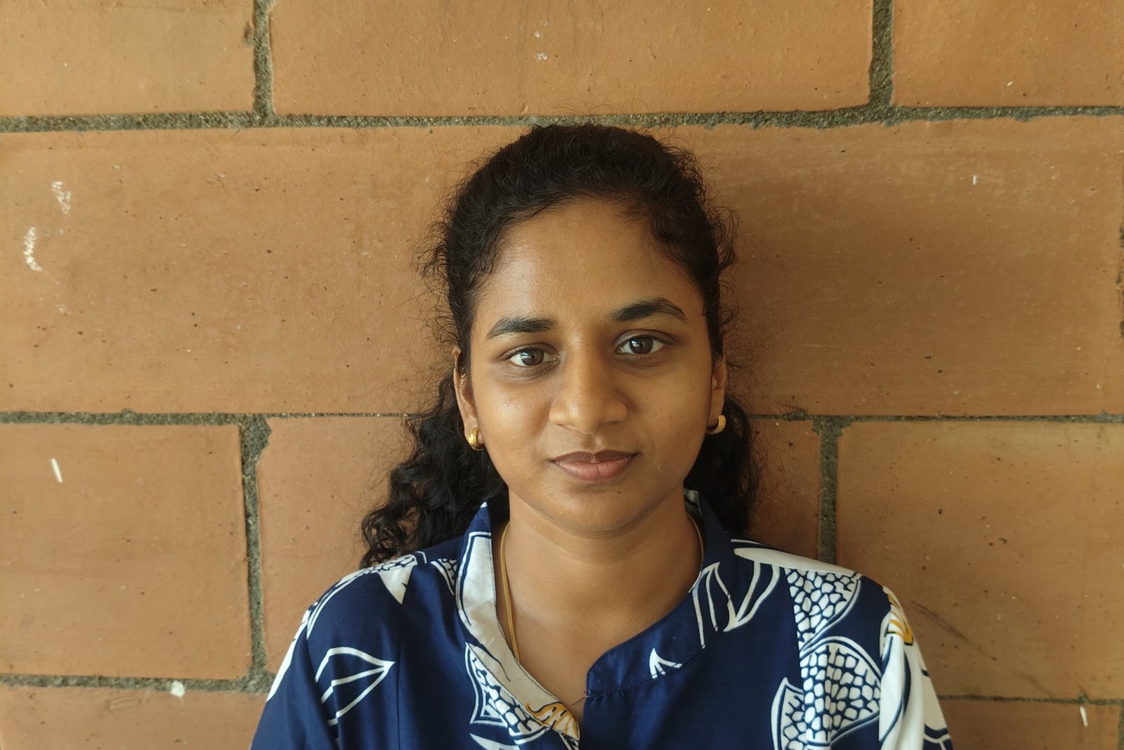 Portrait of JEMI NESHA, Teacher